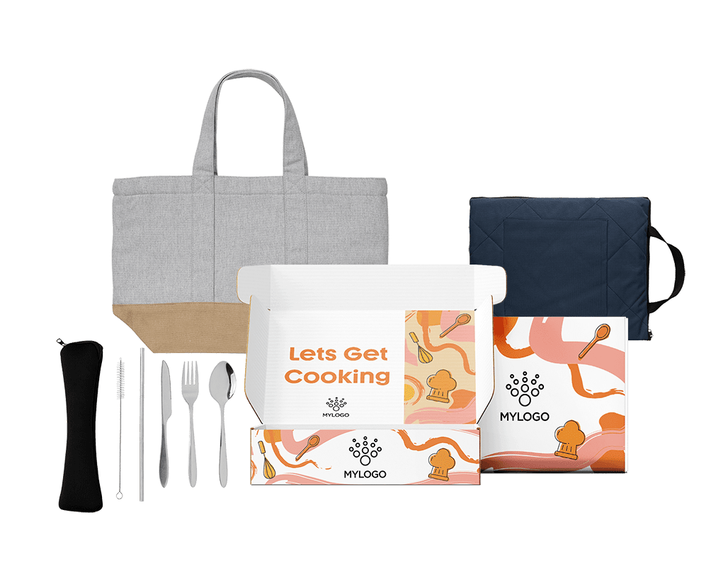 Pack de regalo corporativo para cocina con bolsa tote, bolsa térmica y set de cubiertos reutilizables en caja personalizable.