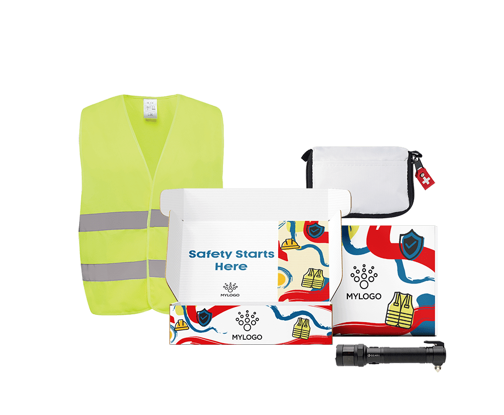 Kit de seguridad laboral personalizado con chaleco reflectante amarillo, linterna y bolsa de emergencia en caja regalo corporativa.